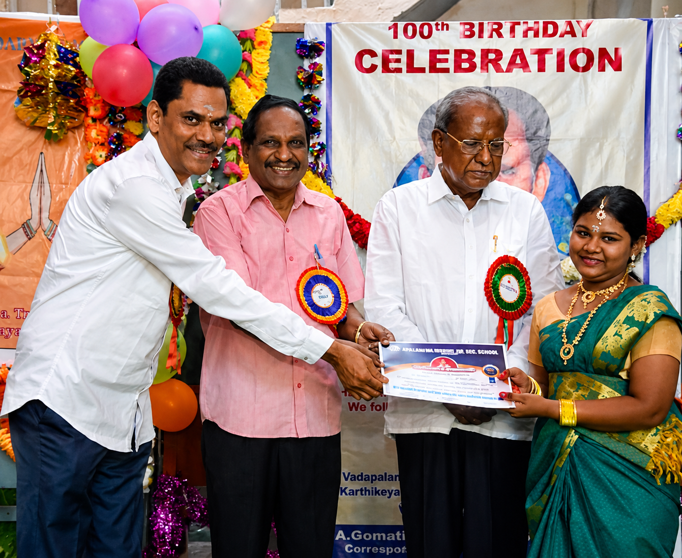 Award ceremony featuring school achievers and school management